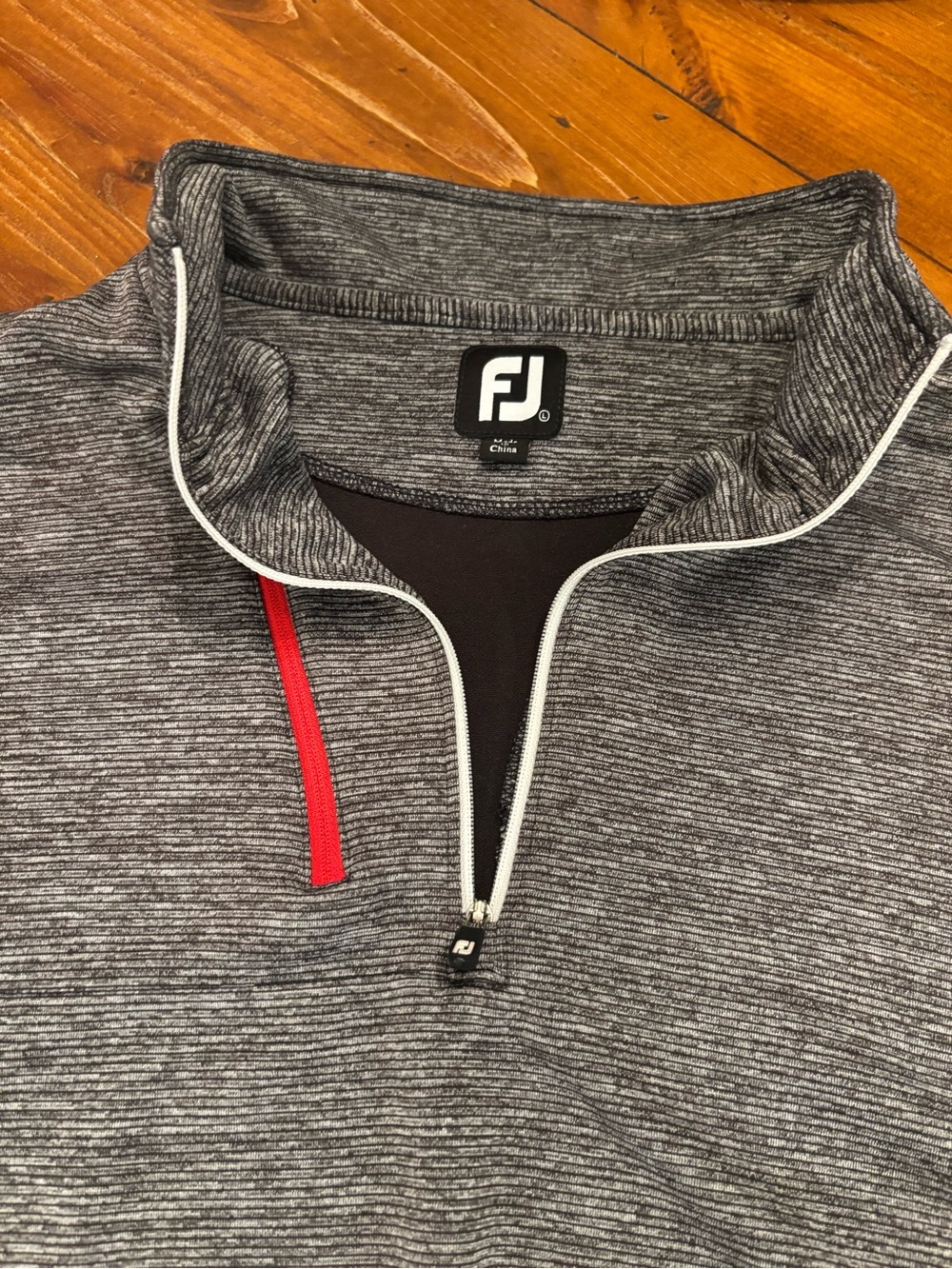 FootJoy Gray Heather Quarter-Zip Pullover with Red Accent and golf logo on arm